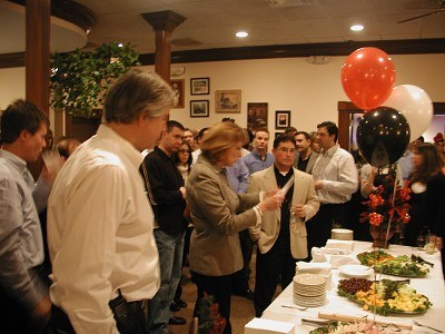 Amsterdam Mayor Anne Thane addresses the crowd during cocktail hour